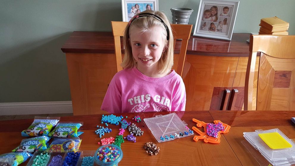 PHOTO: Arianna Nichols, 8, has been hand making crosses out of Perler beads and sending them to police departments across the U.S.