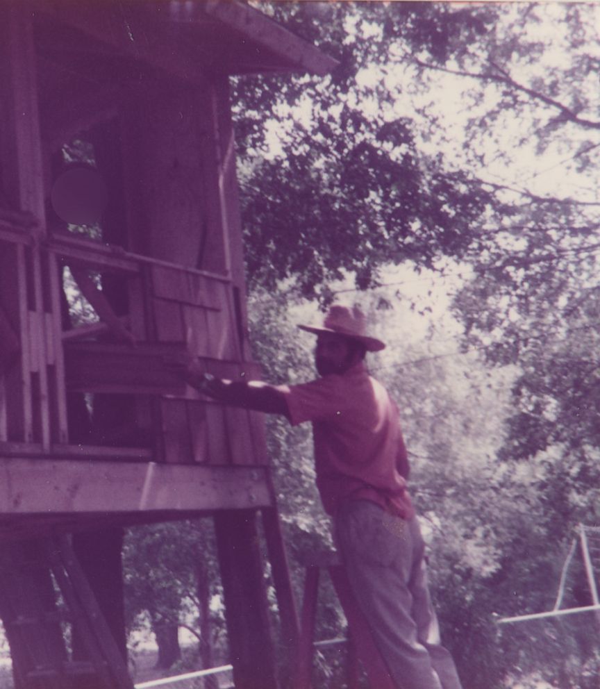 Dennis Rader is seen here building a treehouse in the family's backyard in 1983.  
