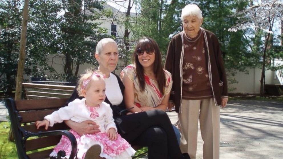 Shirley Warmbrand photographed with granddaughter Geneane Tomasulo, second from right, among four generations of family.