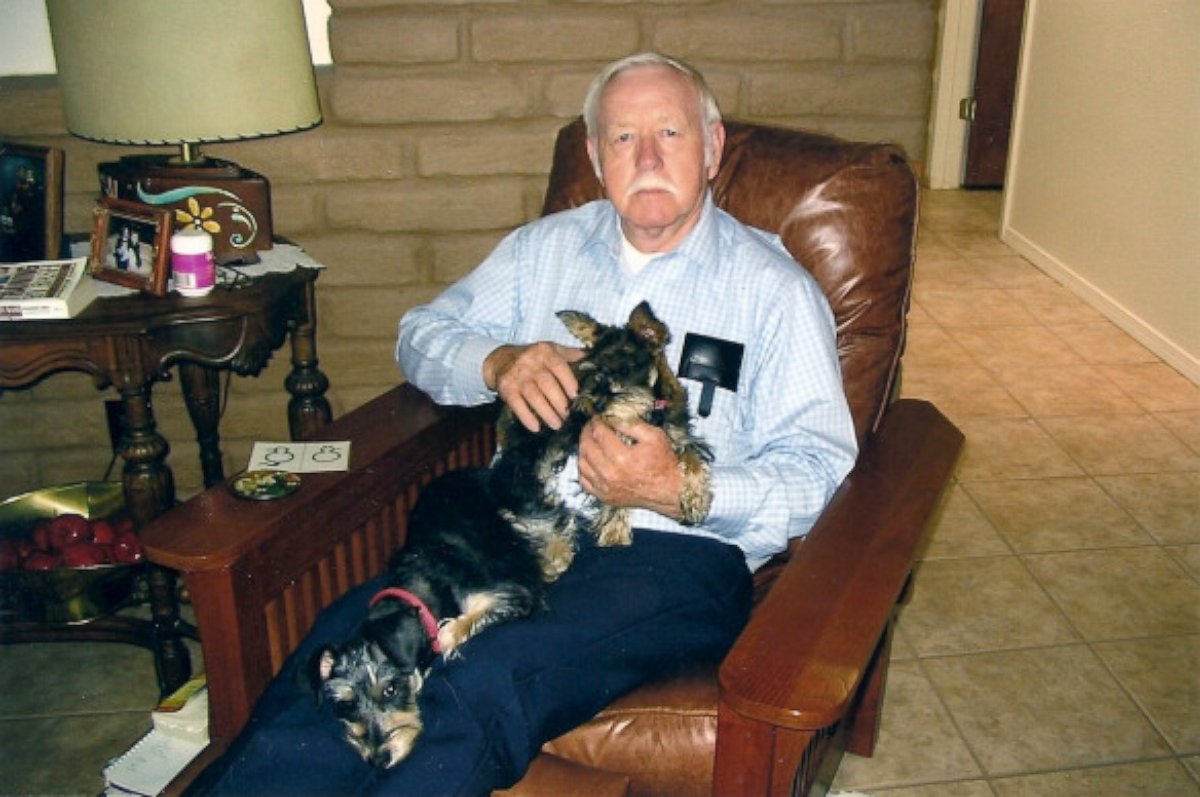 PHOTO: Lisa Abeyta's father in his favorite chair with his own two dogs.