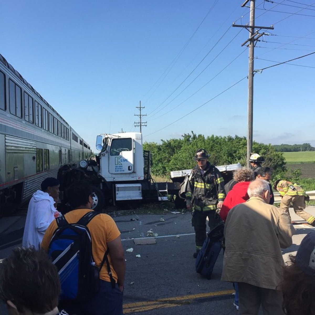 PHOTO: A bystander photo shows the scene where an Amtrak train collided with a truck outside Wilmington, Ill., June 5, 2015.