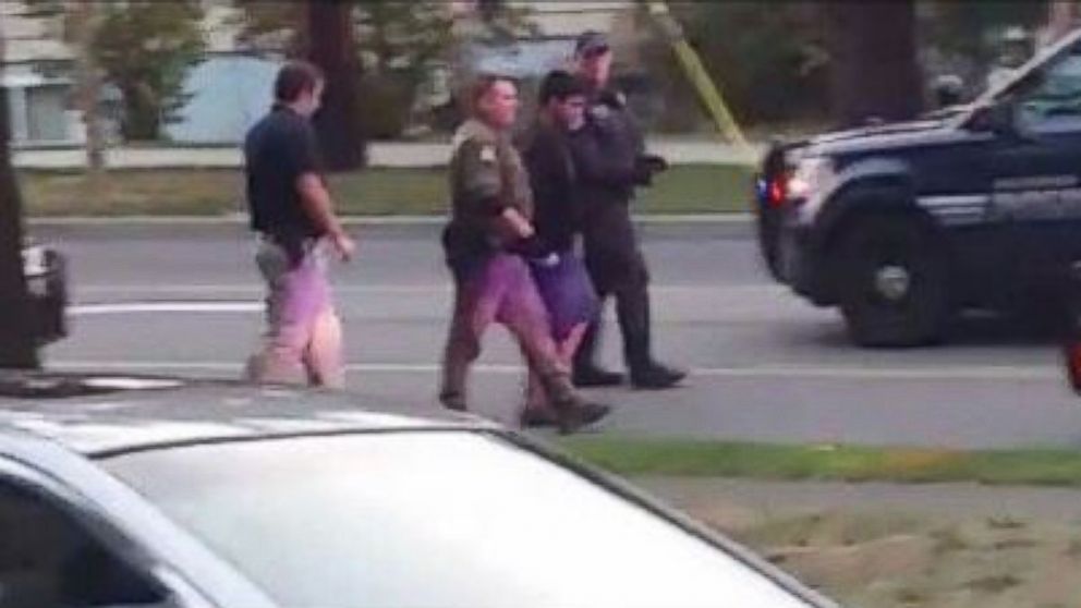 PHOTO: Police take Arcan Cetin into custody in Oak Harbor, Washington, on September 24, 2016. He is the suspected gunman who fatally shot five people at a Macy's in Burlington, Washington, on September 25, 2016.