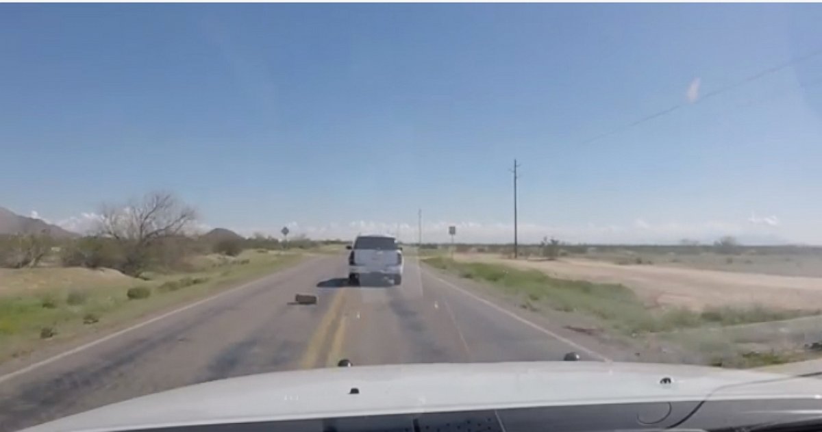 PHOTO: The Pinal County Sheriff's Office in Arizona posted a video to Facebook showing of bales of marijuana being thrown out a car window during a high-speed chase. 