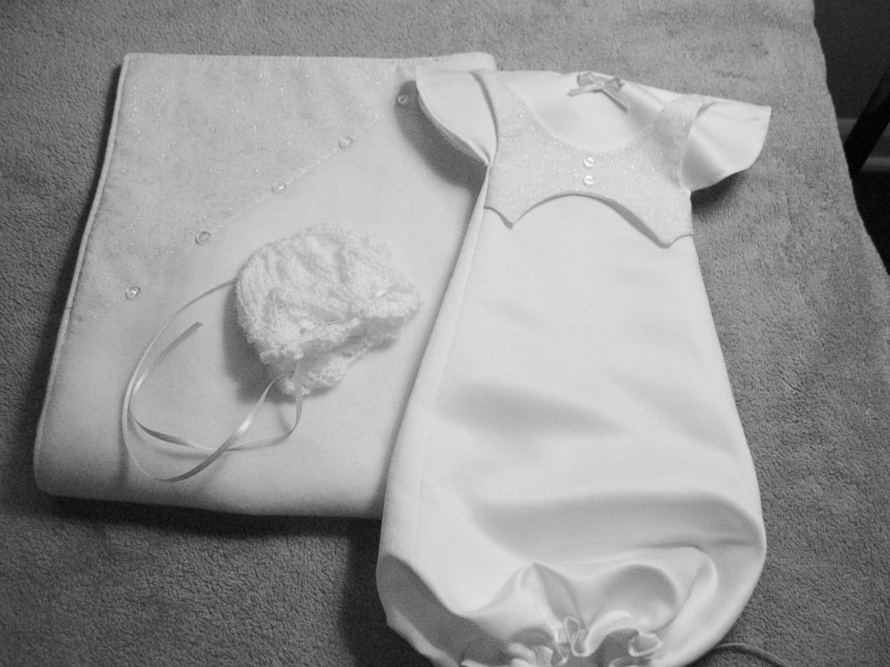Members of the volunteer group Caring Hands for Angels use donated wedding dresses to sew burial gowns for babies in Rochester, N.Y.
