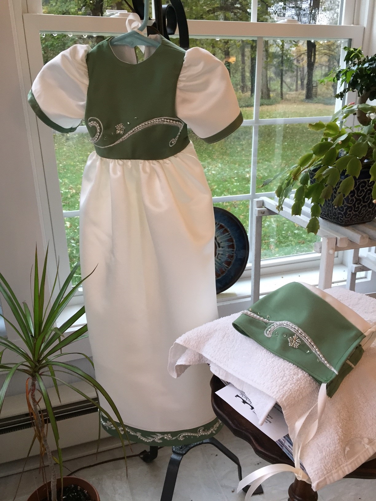 PHOTO: Members of the volunteer group Caring Hands for Angels use donated wedding dresses to sew burial gowns for babies in Rochester, N.Y.
