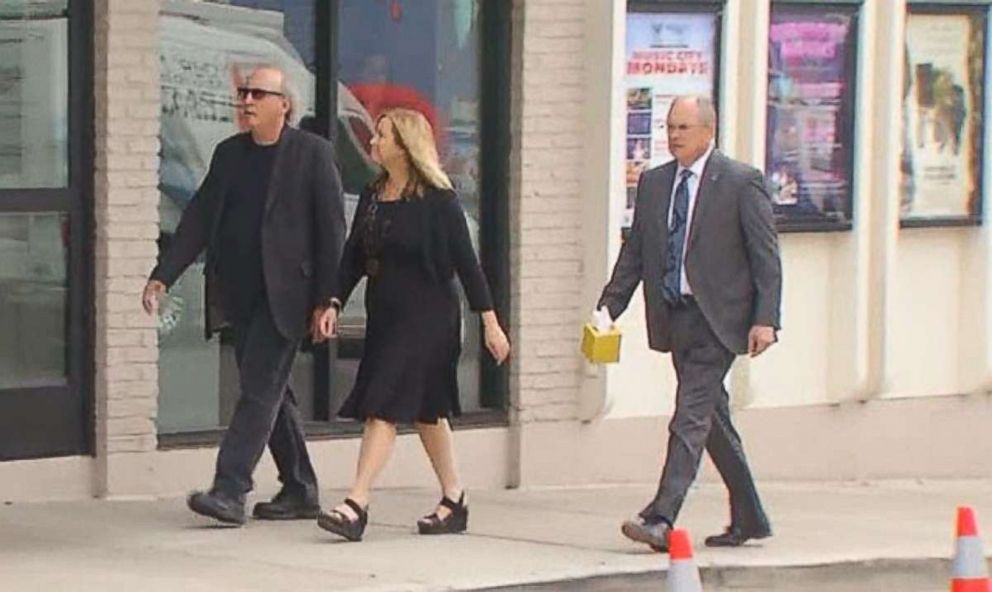 PHOTO: Nashville mayor Megan Barry walks to her son's visitation in July 2017 with her husband Bruce (left) and Sgt. Robert Forrest, the retired police officer whom admitted, along with the mayor, that they had an affair. 