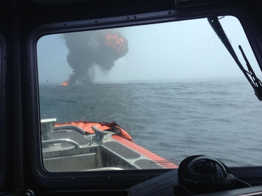 PHOTO: In this photo taken from a Coast Guard response boat, the vessel is shown exploding shortly before it split in half and sank.
