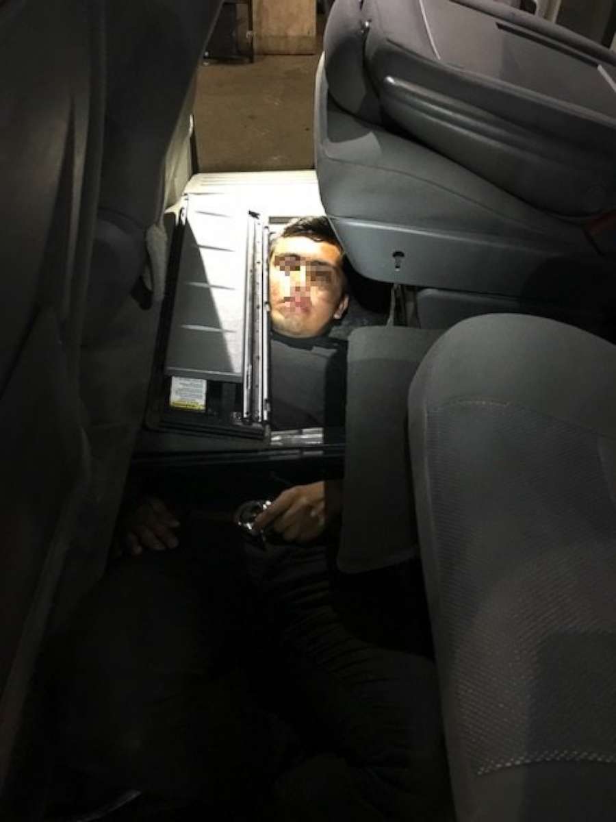 PHOTO: U.S. Customs and Border Protection released this photo of a Mexican national attempting to be smuggled into the U.S. by hiding under a van's floorboard on Sept. 8, 2017, in Arizona.