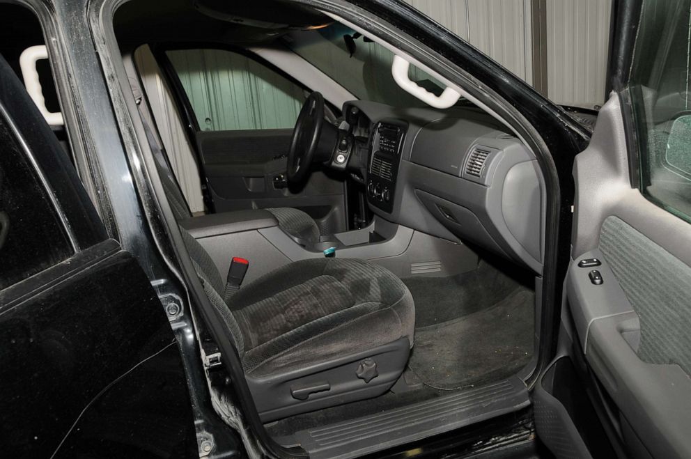 The inside of Cari Farver's car showing the mint container in the middle console.