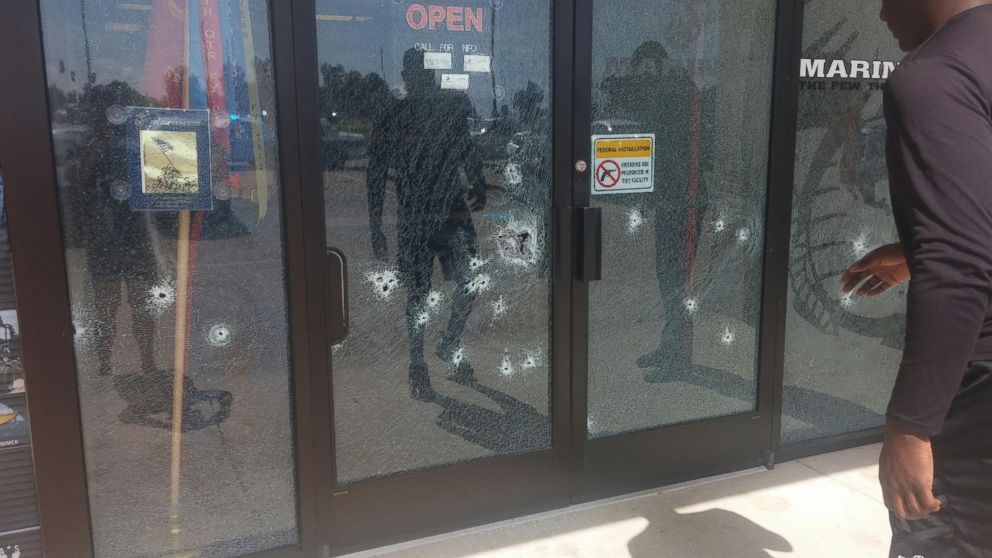 PHOTO: People gather at the scene of a shooting at a military recruitment center in Chattanooga, Tenn., July 16, 2015.