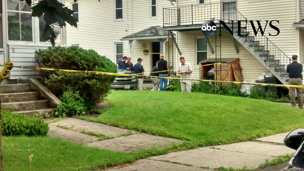 PHOTO: Federal agents search a home in Adams, Mass. on July 4.