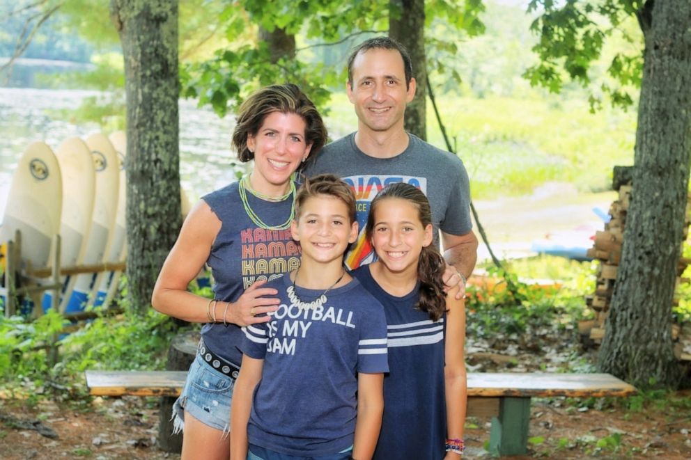 COVID-19 survivor Diana Berrent of Long Island, New York, is seen here with her family.