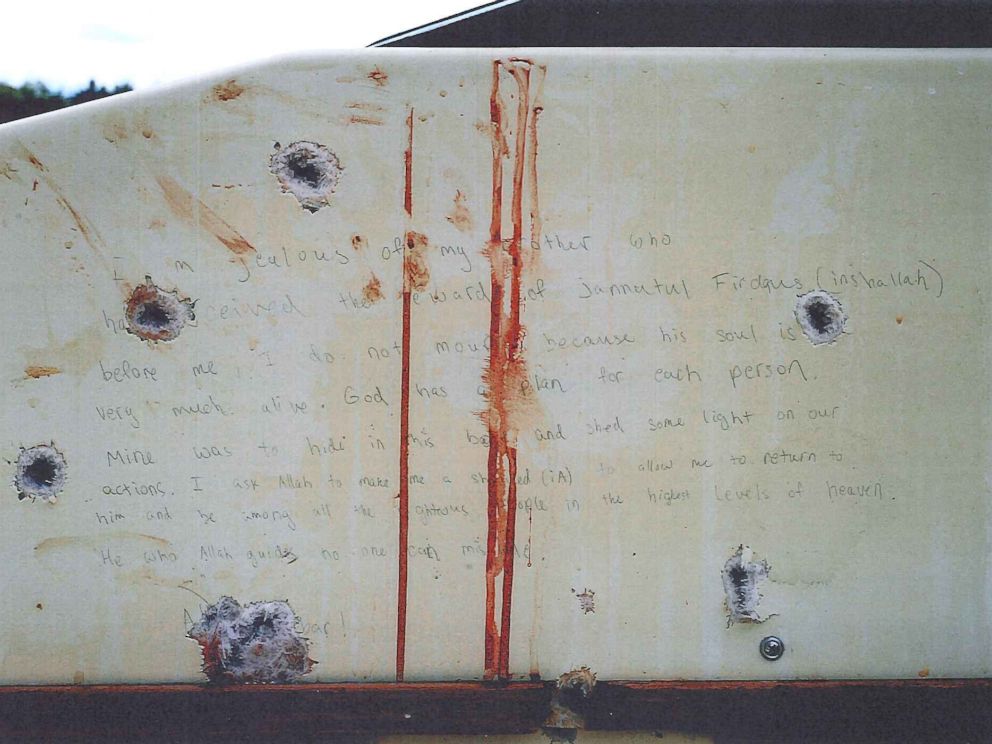 PHOTO: During the Boston Marathon bombing trial, prosecutors released images of the note written by alleged bomber Dzhokhar Tsarnaev on the wall of a dry-docked boat in which he was found hiding before he was arrested.