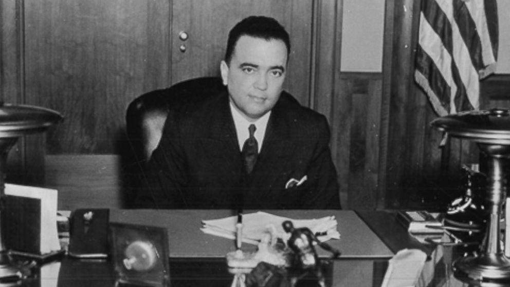 J. Edgar Hoover sits at his desk, circa 1937.