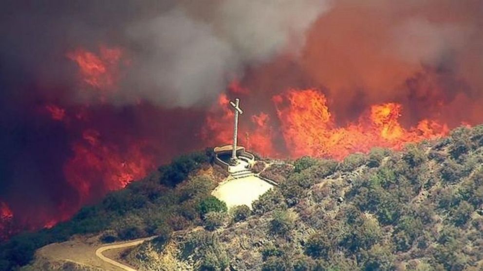 The Blue Cut Fire burns in the San Bernardino National Forest above Devore, California, on Tuesday, Aug. 16, 2016.