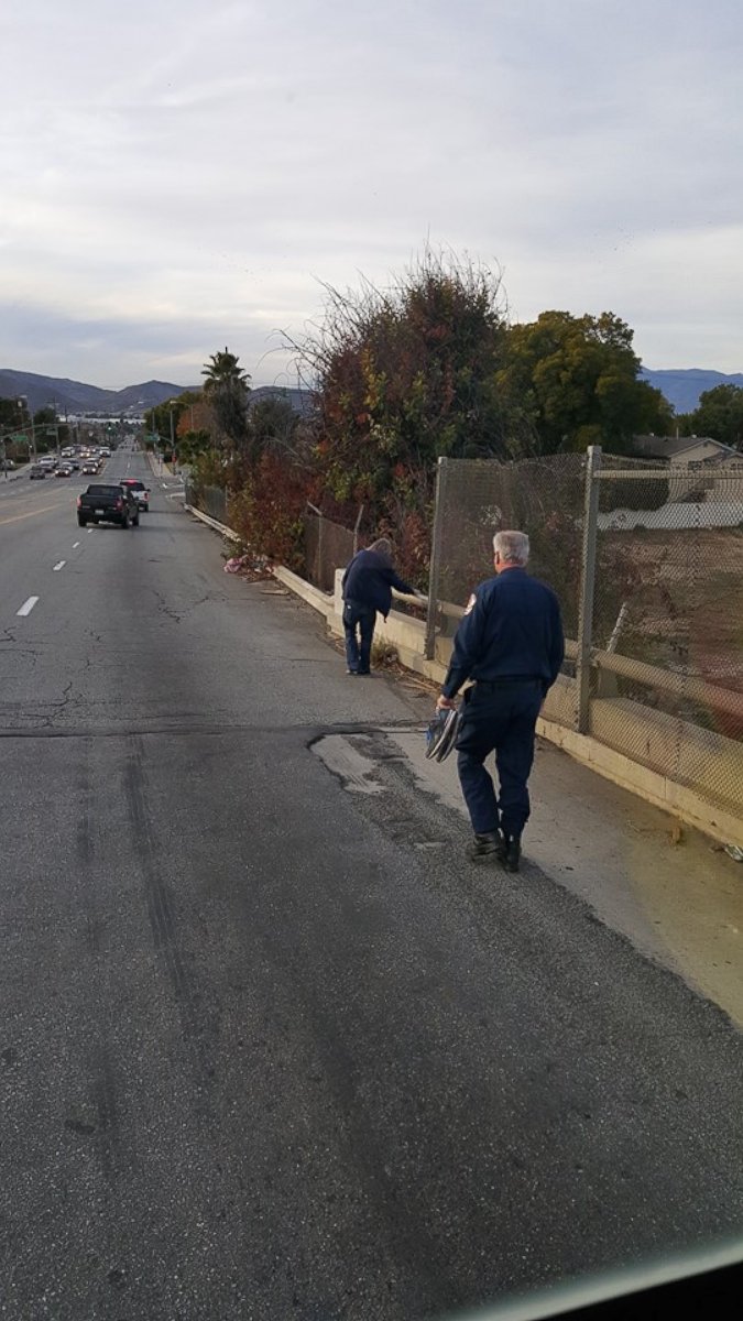 PHOTO: Firefighters in Riverside, Calif., were photographed stopping to give shoes to a barefoot homeless man.
