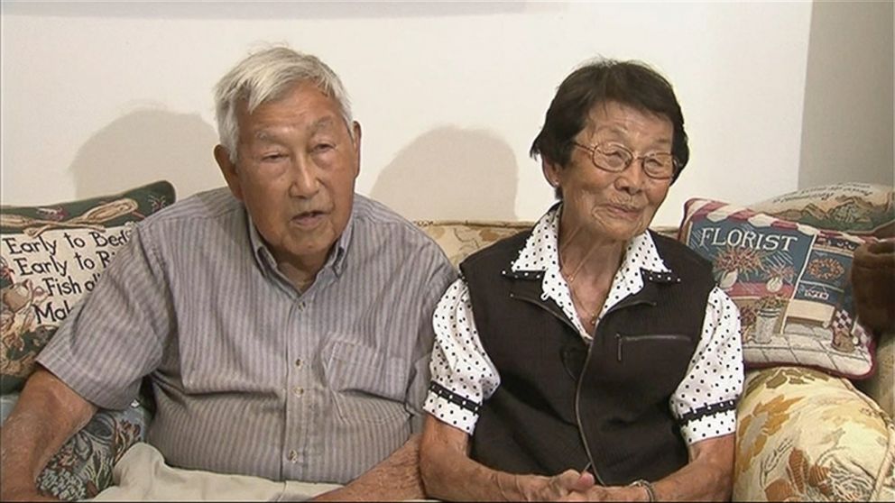 PHOTO: George and Miko Kaihara who survived life in an internment camp during WWII and finally received their high school degrees on June 18, 2015 at Tustin High School.