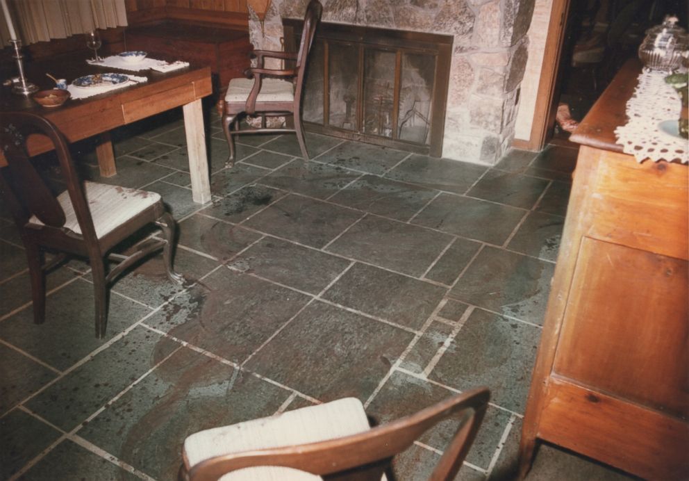 Police photos shows blood on the dining room floor after the Haysom murders. 