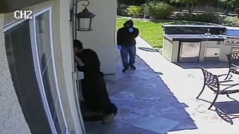 PHOTO: Two men wearing black and holding knives can be seen apparently breaking into a San Jose home, May 8, 2015 in security footage. 