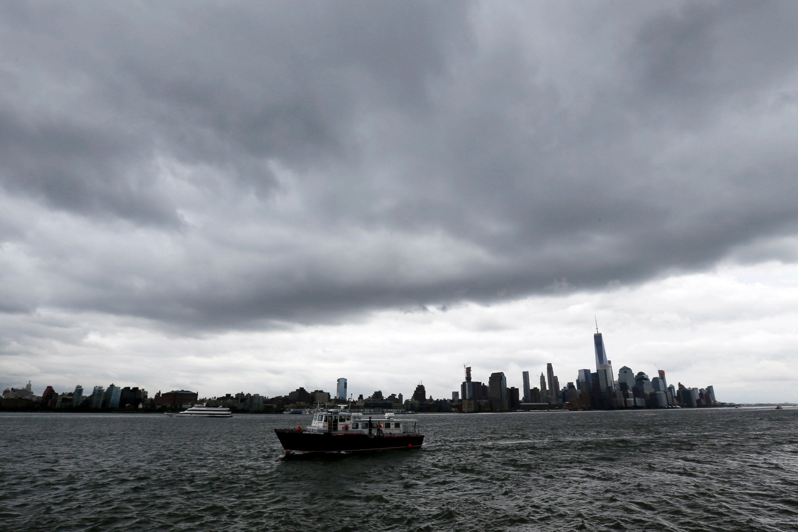 PHOTO: A boat passes Pier A Park on the Hudson River with the New York skyline in the background on Wednesday, Sept. 30, 2015, in Hoboken, N.J. Officials are taking precautions for the rest of the week as forecasters closely follow Hurricane Joaquin. 