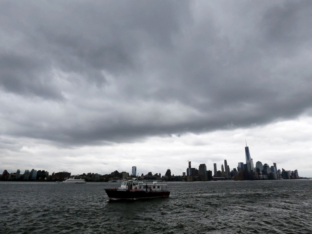 PHOTO: A boat passes Pier A Park on the Hudson River with the New York skyline in the background on Wednesday, Sept. 30, 2015, in Hoboken, N.J. Officials are taking precautions for the rest of the week as forecasters closely follow Hurricane Joaquin.