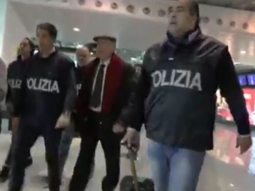 PHOTO: Italian police are shown escorting John Grillo in a video released on YouTube titled "operation underboss," after arresting him in a Milan airport.