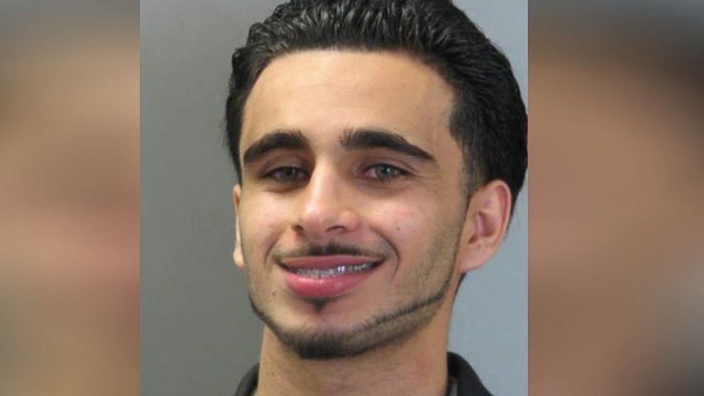 Mohamad Jamal Khweis smiles in a mugshot taken in 2009 in Fairfax County, Virginia.