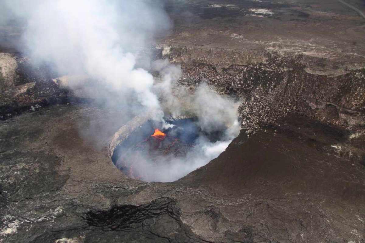 PHOTO: An aerial image released on March 15, 2013 shows lava visible below the Overlook crater of Hawaii's Kilauea Volcano. 