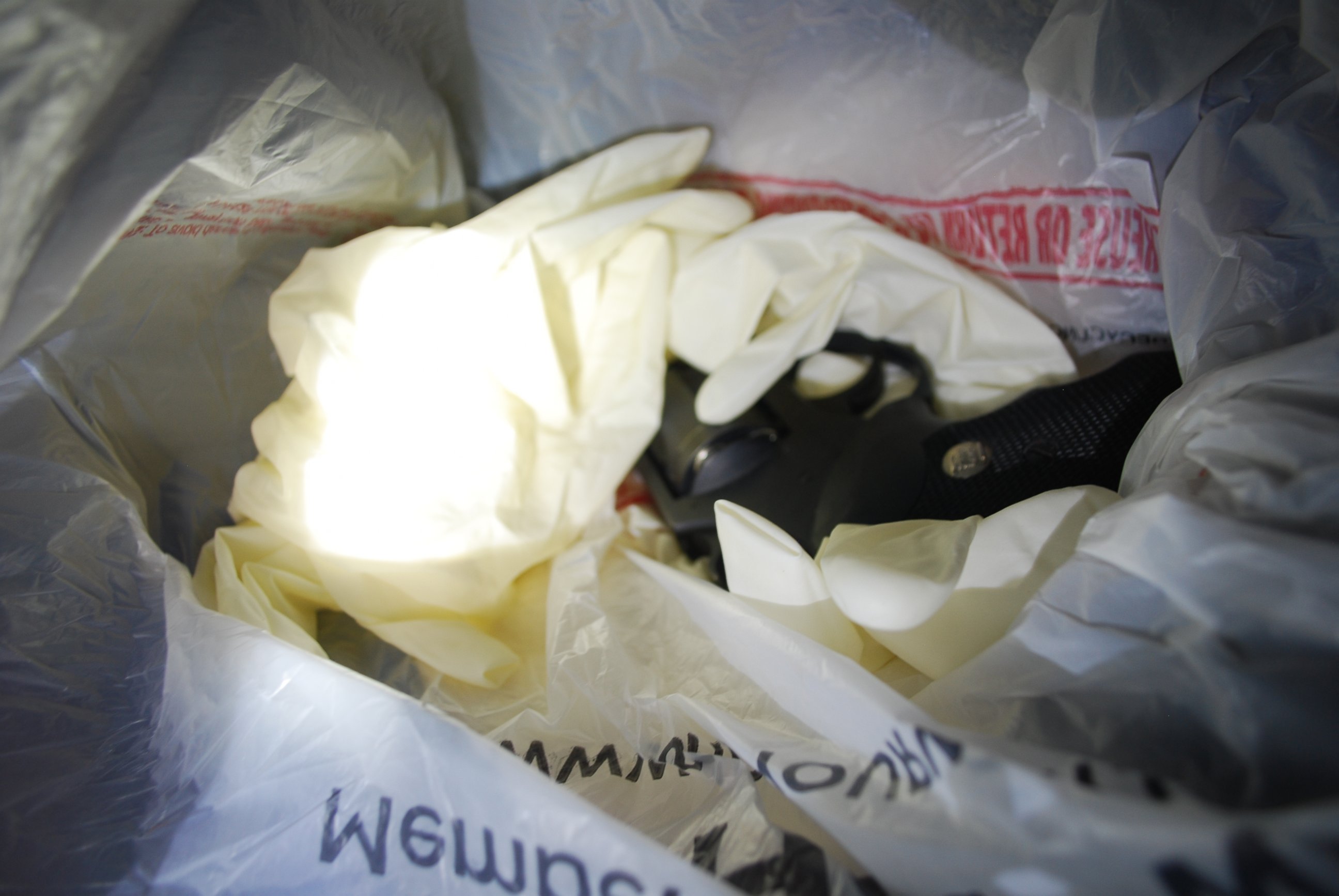 PHOTO: Police found this bag of rubber gloves and a gun in the garage of the rental home Dr. Gregory Konrath and Joannah shared.
