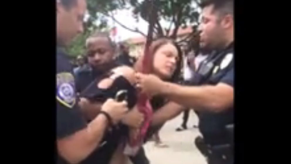 PHOTO: In an image made from video released on April 18, 2015, former U.S. Air Force Staff Sgt. Michelle Manhart is detained by police officers on the campus of Valdosta State University in Valdosta, Ga.