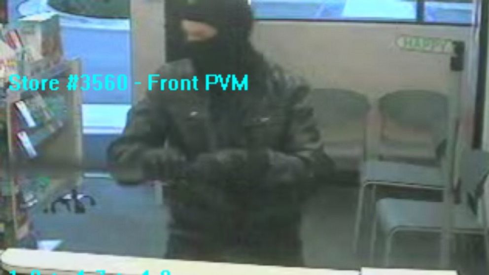 This surveillance photo shows a man, dressed like a ninja, who allegedly robbed a Walgreens Pharmacy in Placentia, California, on July 29, 2015. 