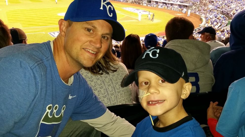 PHOTO: Scott Wilson and his son Noah at the World Series on Oct. 21, 2014.