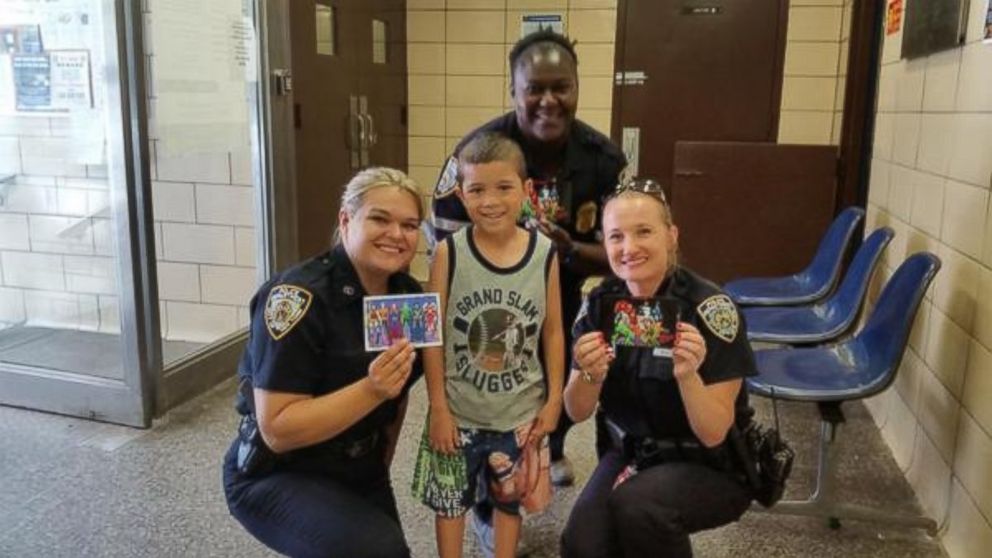 PHOTO: Zachary Becerra, 7, is on a mission to hand out super hero cards to every NYPD precinct.
