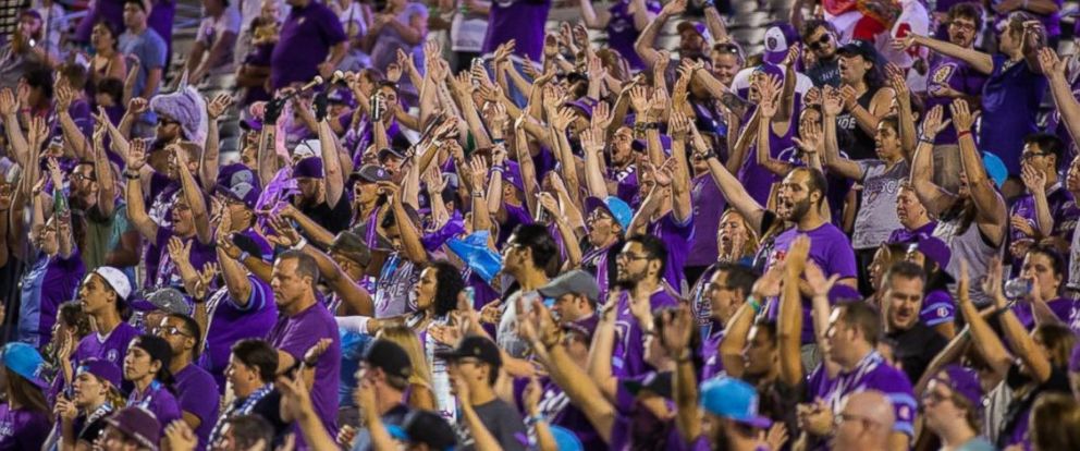 PHOTO: MLS Orlando City soccer fans cheer on their team.