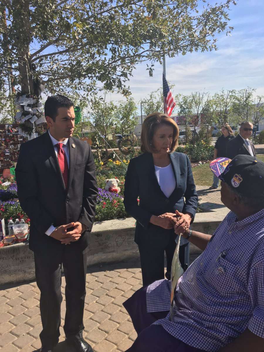 PHOTO: Rep. Ruben Kihuen, D-Nevada, and House Minority Leader Nancy Pelosi at the Las Vegas Community Healing Garden on October 17, 2017.