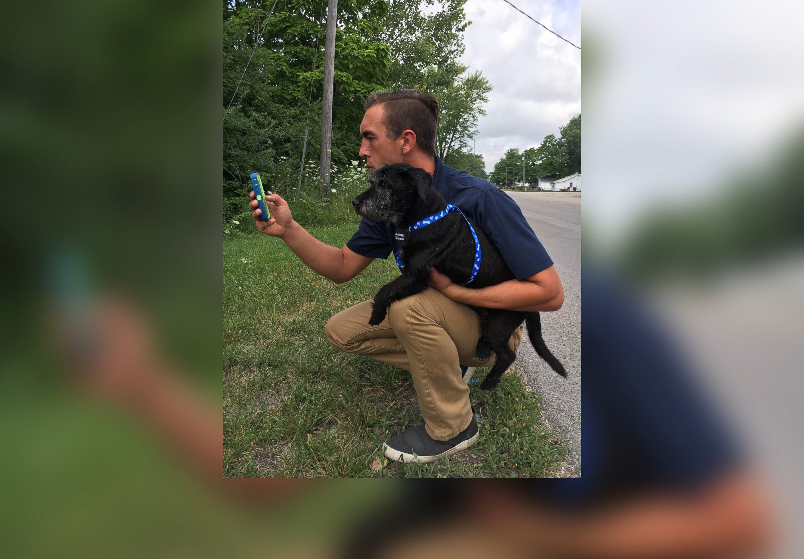 PHOTO: Muncie Animal Shelter Director Phil Peckinpaugh is pictured here on a Pokemon hunt with shelter dog Winston.