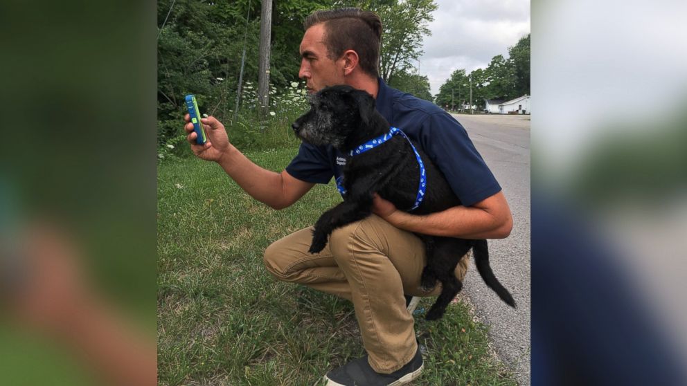 PHOTO: Muncie Animal Shelter Director Phil Peckinpaugh is pictured here on a Pokemon hunt with shelter dog Winston.