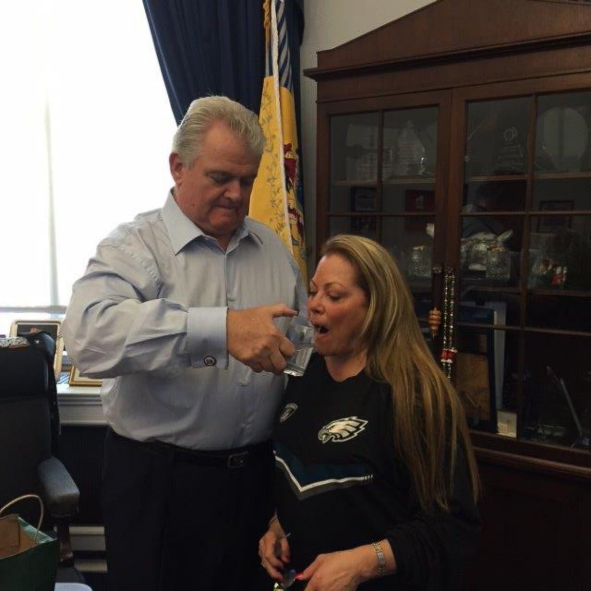 PHOTO: Representative Bob Brady, D-Pa., helps his wife Mrs. Debra Brady drink out of the glass that Pope Francis drank out of during his speech to Congress Sept. 25, 2015. 