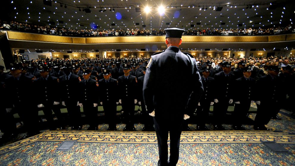 PHOTO: A drill instructor presents the class at the New York City Fire Department's Probationary Firefighter Graduation ceremony at the Christian Cultural Center in Brooklyn on Nov. 18, 2014.