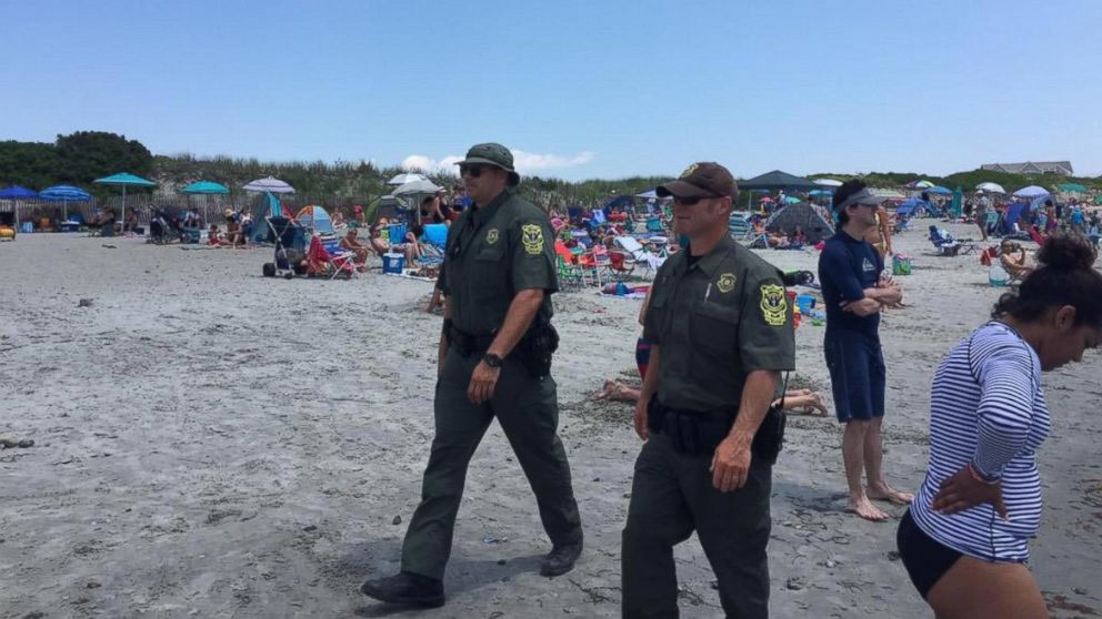 PHOTO: Officials are now patrolling Roger Wheeler Beach in Narragansett, Rhode Island after a possible explosion half a mile away at Salty Brine Beach on July 11, 2015.