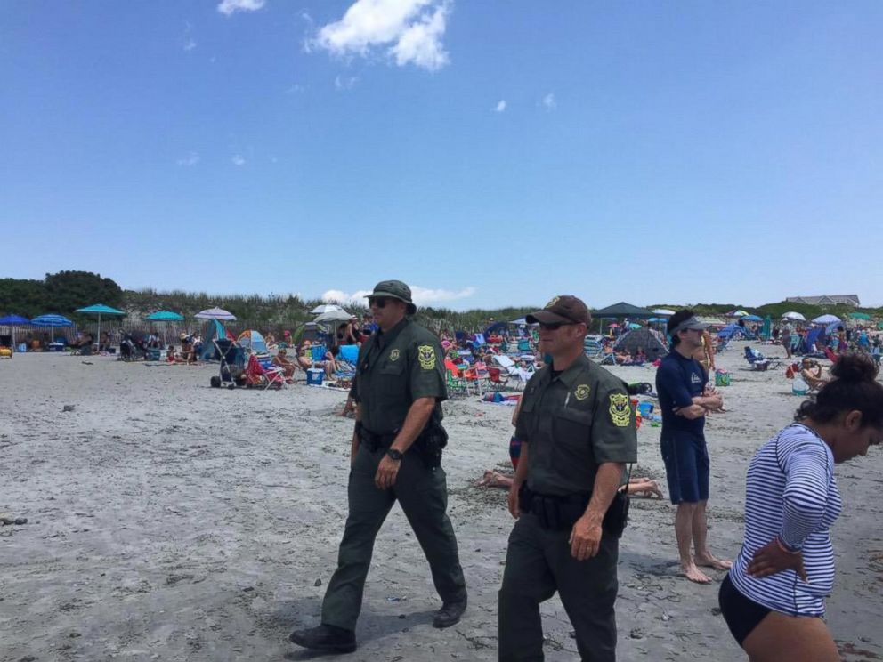 PHOTO: Officials are now patrolling Roger Wheeler Beach in Narragansett, Rhode Island after a possible explosion half a mile away at Salty Brine Beach on July 11, 2015.