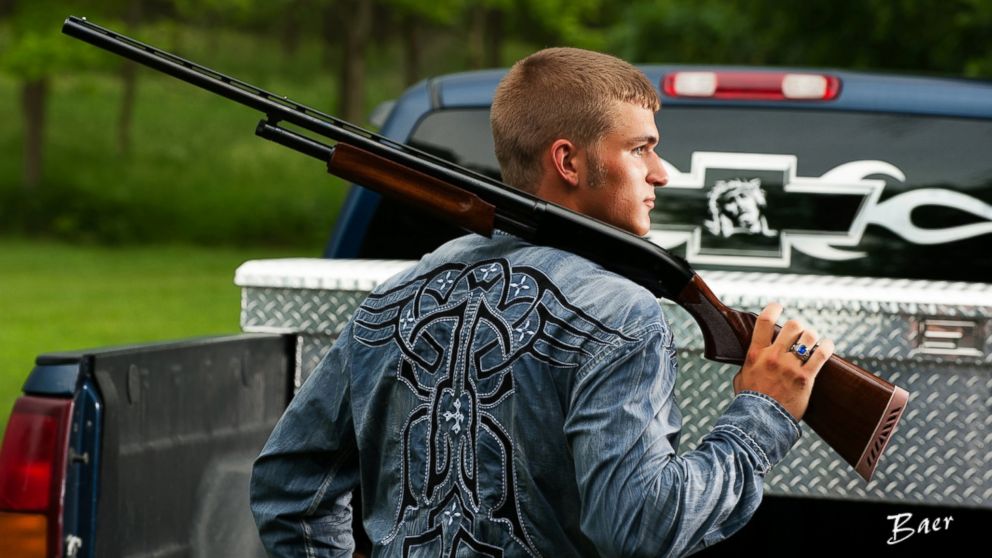 PHOTO: Dustin Langenberg of Bertrand, Neb. poses with a gun and a Ford truck.