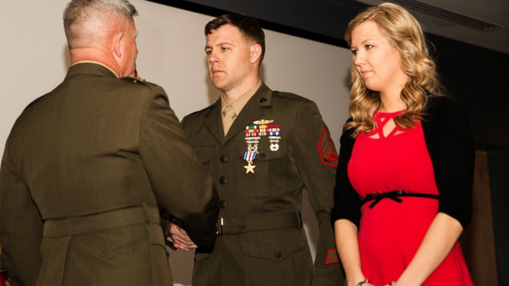 PHOTO: Major Gen. Joseph L. Osterman, commander, U.S. Marine Corps Forces, Special Operations Command, awards Staff Sgt. Andrew C. Seif the Silver Star Medal during a ceremony at Stone Bay aboard Marine Corps Base Camp Lejeune, N.C., March 6, 2015.