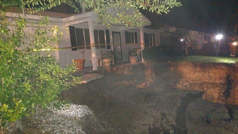 PHOTO: A water main break in Ocala, Fla. on Dec. 9, 2015, resulted in a massive sinkhole. 