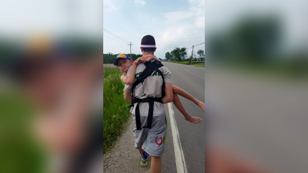 PHOTO: Hunter Gandee, 15, walked 57 miles with his 8-year-old brother, Braden, on his back to raise awareness for Cerebral Palsy. 