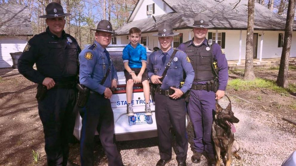 PHOTO: Arkansas State Troopers celebrate Toxey Ahrabli's 10th birthday in Hot Springs Village, Arkansas on April 4, 2016.