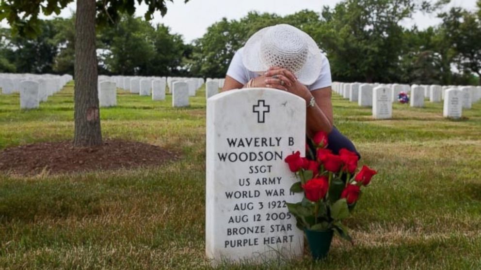 PHOTO: Joann Woodson visits the grave of her husband, Waverly Woodson, a WWII veteran.