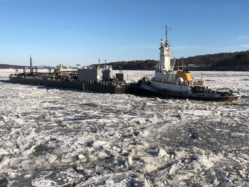 PHOTO: Coast Guard Cutter Penobscot Bay helps break free commercial tug Brooklyn from the ice on the Hudson River near Saugerties, N.Y., Dec. 31 2017.