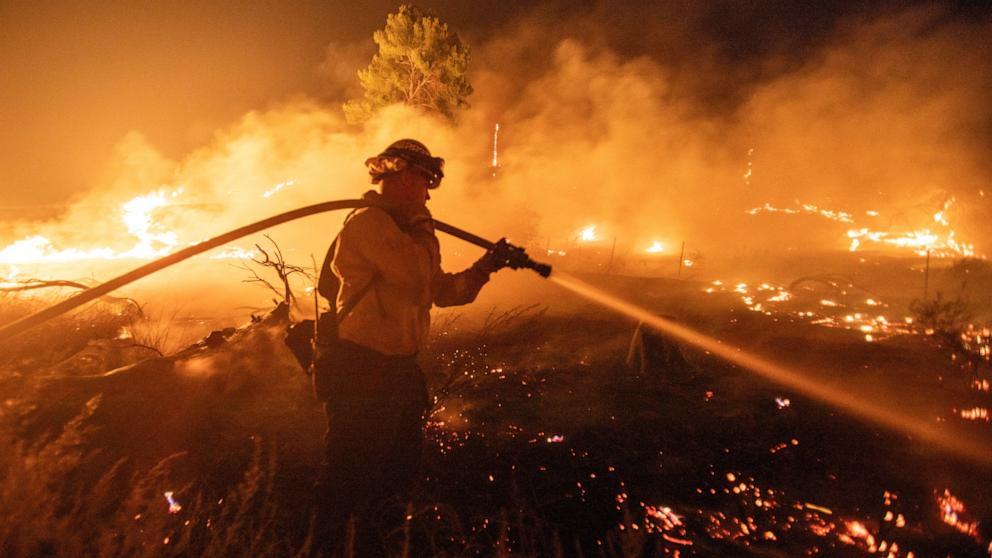PHOTO: A firefighter battles the Hughes Fire near Castaic Lake, north of Santa Clarita, California, Jan. 22, 2025.