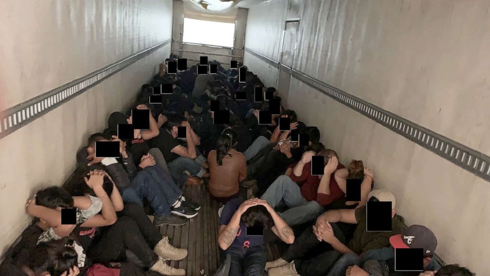 PHOTO: 81 migrants in the back of a tractor trailer are seen in an handout from DOJ. 